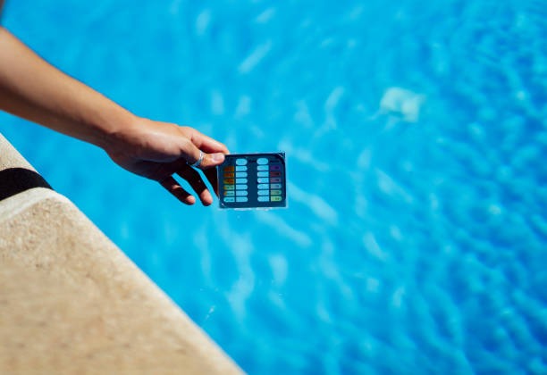 imgi 8 maintenance staff checking the ph of the pool